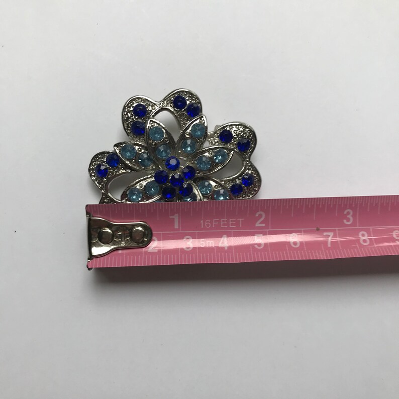 Vintage Silvertone Blue Rhinestone Flower Brooch