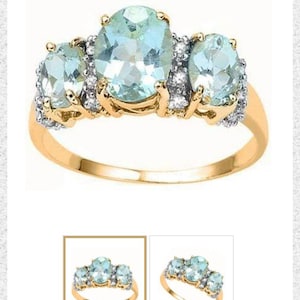 Könnte beinhalten: Ein goldener Ring mit drei ovalen Aquamarin-Edelsteinen und kleinen Diamanten, die in die Ringschiene eingefasst sind.