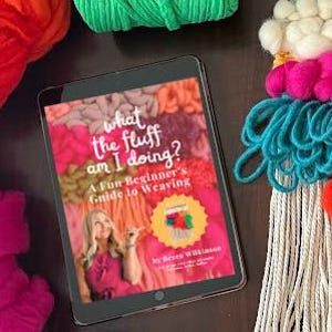 May include: A weaving kit featuring a wooden loom, white scissors, and various balls of yarn in orange, green, pink, white, yellow, lavender, and light blue. A tablet displays the book titled What the Fluff Am I Doing? A Fun Beginner's Guide to Weaving.