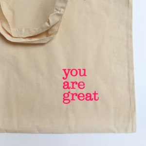 you are great hand-printed bag tote bag pink neon Typo Herr Fuchs image 1