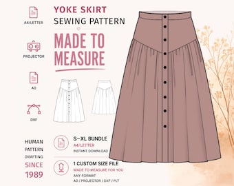 Peut inclure: Un patron de couture pour une jupe à empiècement avec une fermeture boutonnée sur le devant. L'illustration montre une jupe mauve à taille haute et panneau inférieur froncé. Le texte inclut YOKE SKIRT SEWING PATTERN, MADE TO MEASURE, S-XL BUNDLE.