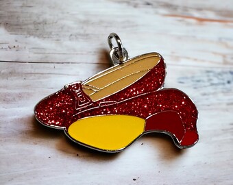 Charm de zapatillas rojo rubí "Los zapatos del cliente" de fieltro amarillo del Mago de Oz