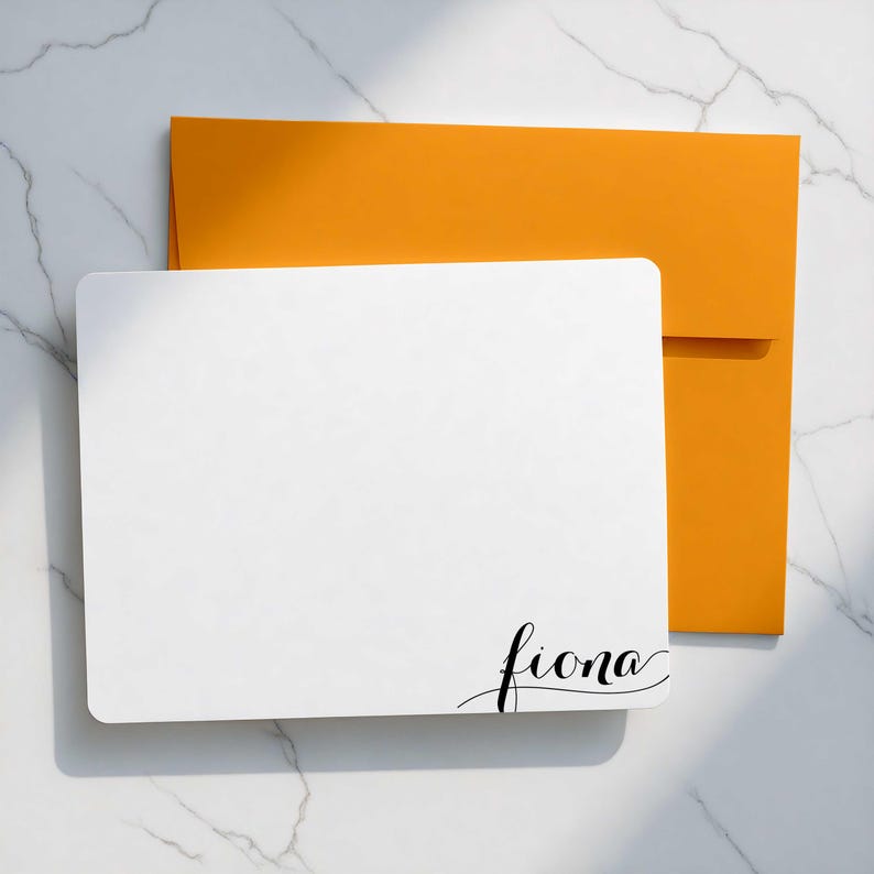 Note cards with envelopes featuring a personalized name in modern black calligraphy