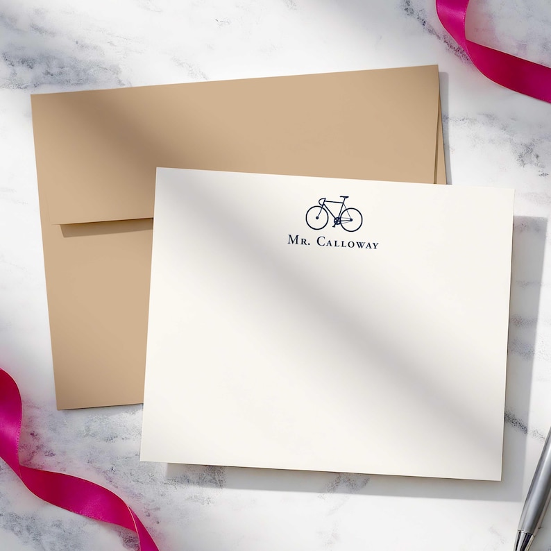 Bike stationary set with personalized notecards, bicycle illustration, and envelopes, designed as a useful gift for men who enjoy handwritten notes.