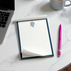 Custom notepad with slim monogram initials and personalized text, made for thoughtful stationery for women who love useful paper.