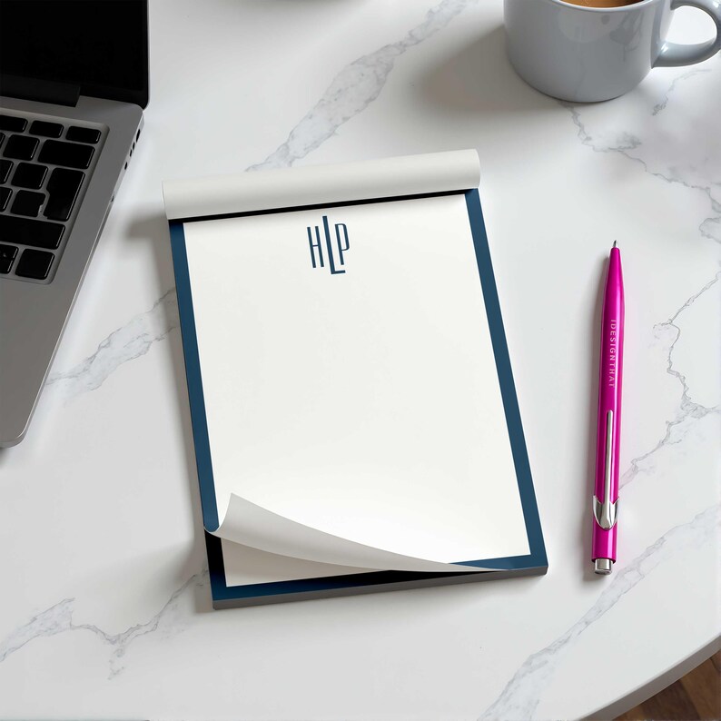 Custom notepad with slim monogram initials and personalized text, made for thoughtful stationery for women who love useful paper.