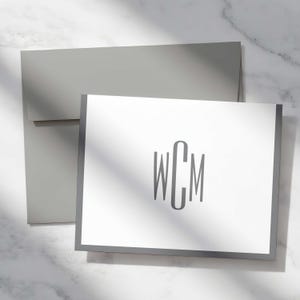 Personalized notes with a streamlined monogram design, substantial eggshell cardstock, and coordinating envelopes.