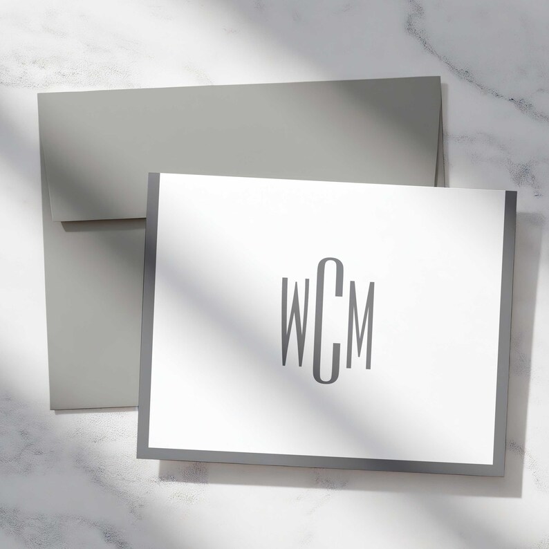 Personalized notes with a streamlined monogram design, substantial eggshell cardstock, and coordinating envelopes.