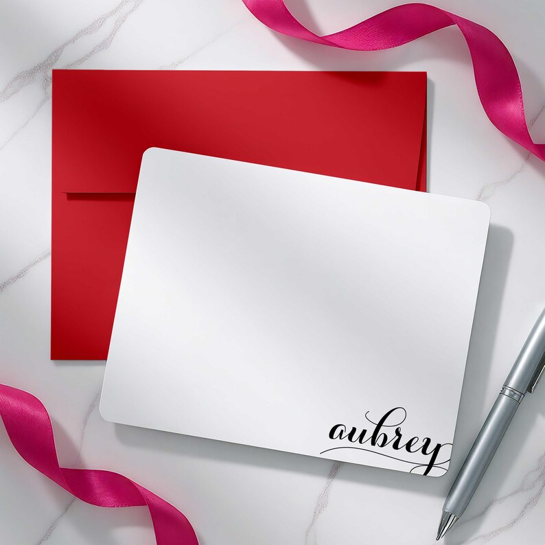 Custom notecard set featuring a bold swash name design and colorful envelope options