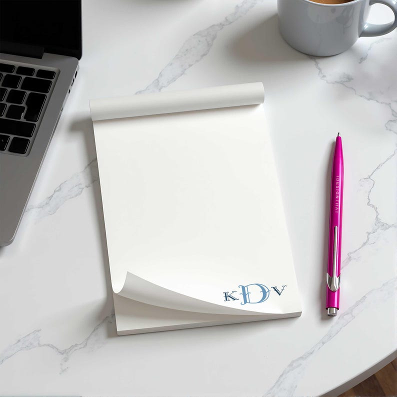 Monogrammed pad with lined or unlined page options, made for lists, reminders, and everyday paper notes.