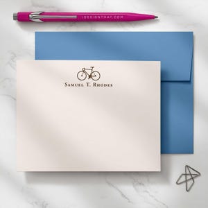 Gift for men featuring personalized bike note cards with envelopes, custom name text, and a clean bicycle stationery design.