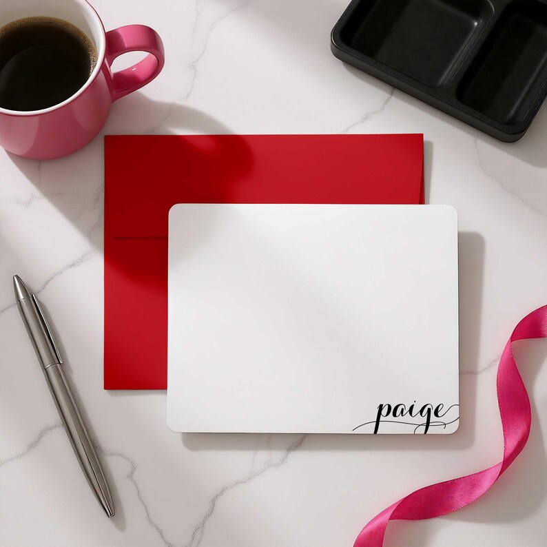 Flat notecards personalized with a name in modern calligraphy, designed as stationery for women