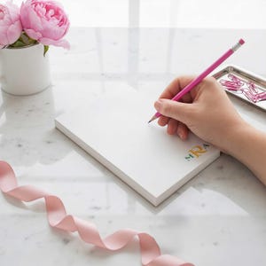 Custom note pad with bold initial design, made for planning, desk notes, and everyday writing.