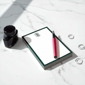 Personalized pads with clean monogram styling, designed as stationery for women who like paper that feels polished and practical.