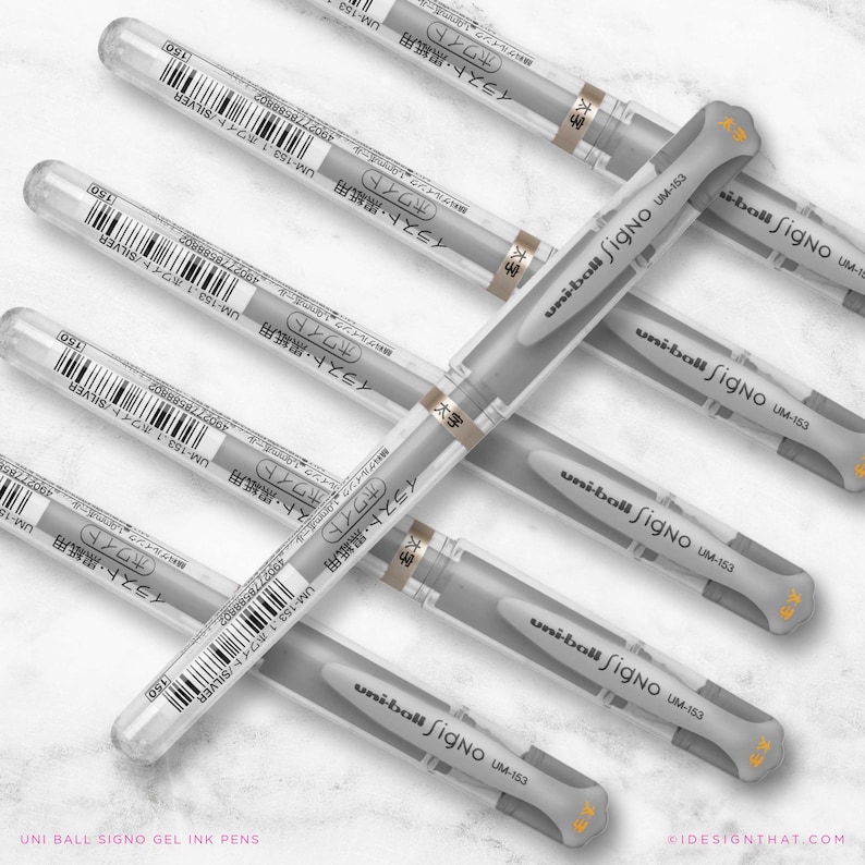 May include: A selection of silver Uni-ball Signo UM-153 gel ink pens. Each pen is housed in a clear plastic tube, with the pen's body in a light grey colour. The text "uni-ball Signo UM-153" is printed on the pen's body.