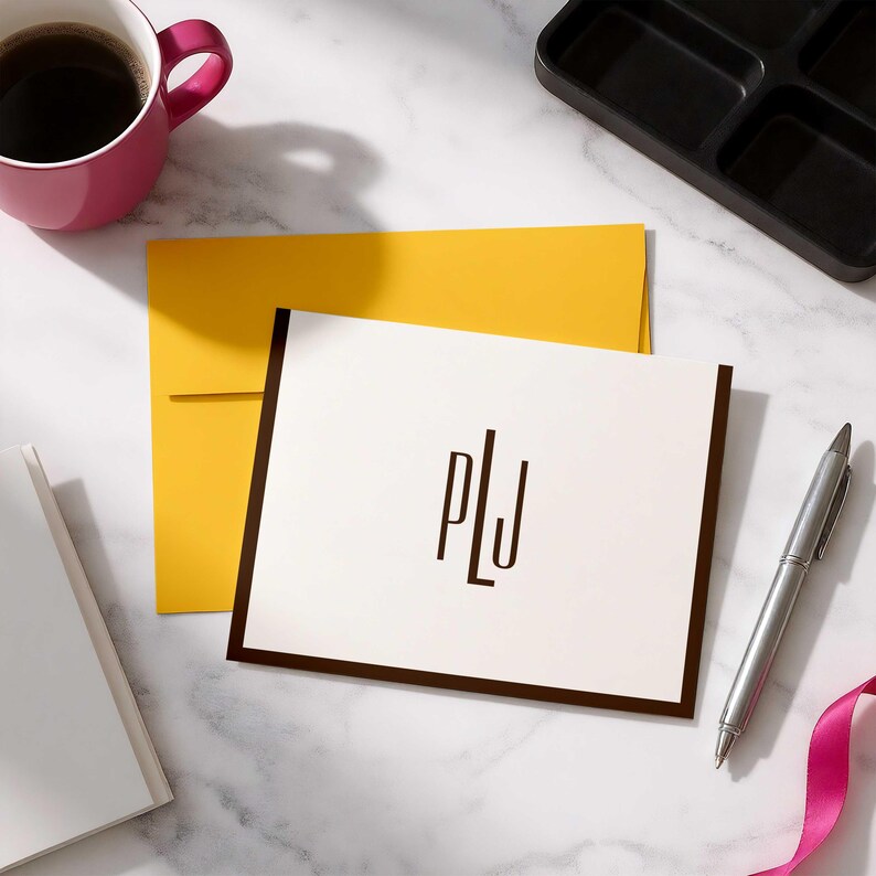 Business note cards featuring a refined monogram and coordinating envelopes for polished handwritten communication.