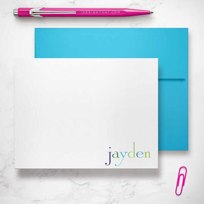Personalized gift for girls or boys featuring flat rainbow notecards with custom name printing