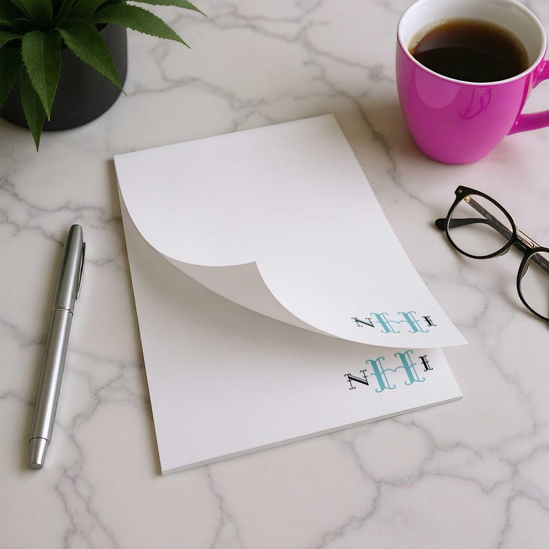 Thick monogrammed writing pad with custom initials, smooth paper, and clean space for notes.