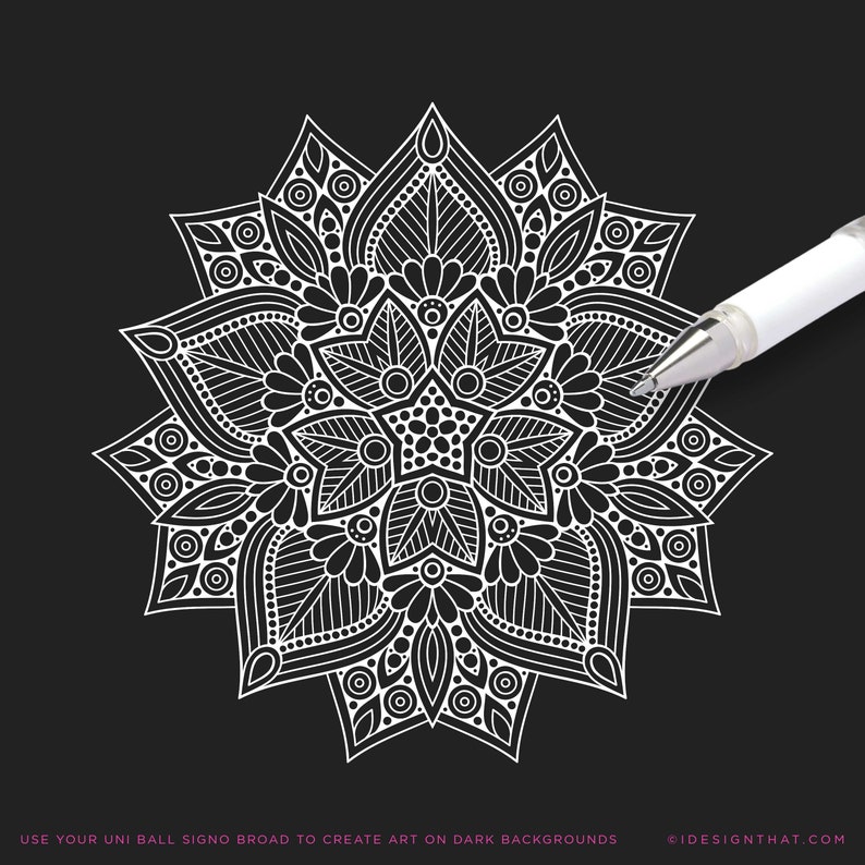 May include: A white pen illustrating a complex mandala design on a black backdrop. The mandala showcases elaborate floral and geometric patterns. The image includes the text "USE YOUR UNI BALL SIGNO BROAD TO CREATE ART ON DARK BACKGROUNDS".