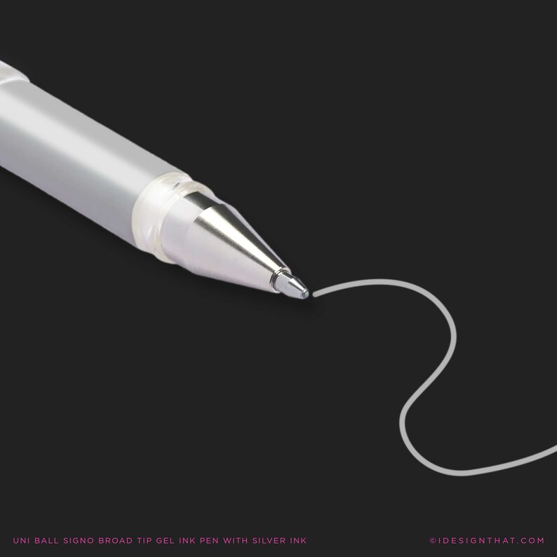 May include: A close-up shot of a silver and translucent gel ink pen with a broad tip, drawing a white line on a black backdrop. The pen is labelled "UNI BALL SIGNO BROAD TIP GEL INK PEN WITH SILVER INK".