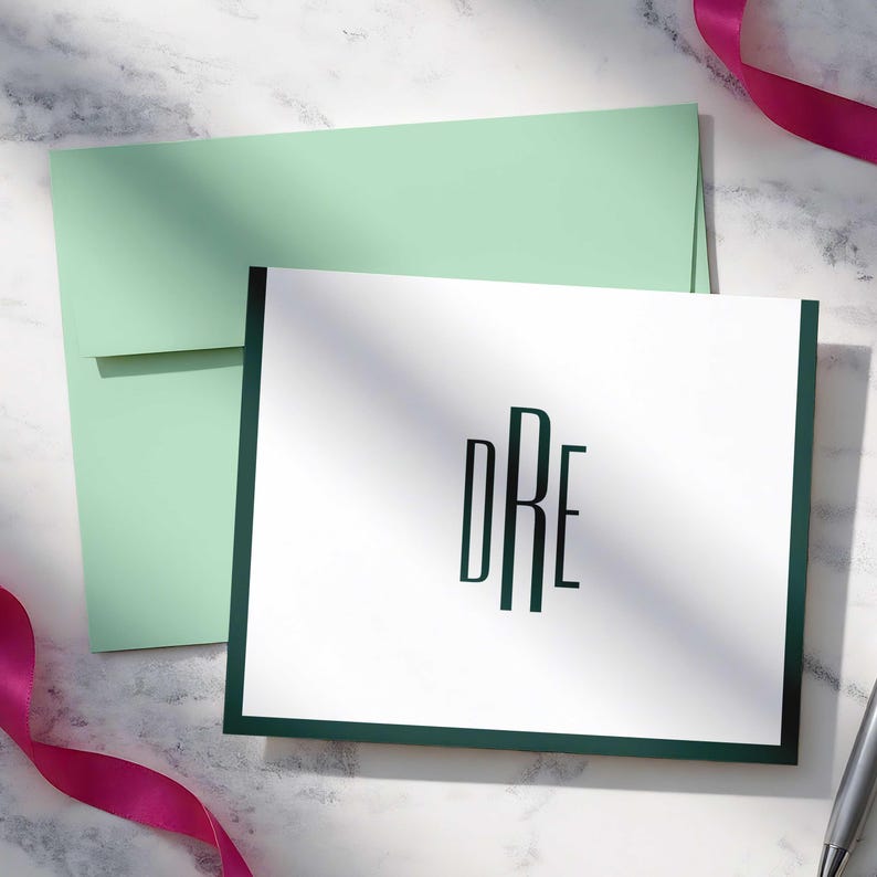 Custom notecards with a clean vertical monogram and blank inside cards for handwritten messages and everyday correspondence.