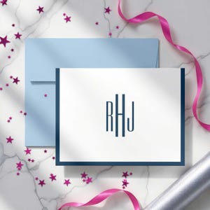 Classic stationary with a slim vertical monogram, folded cards, and a blank interior for writing your own message.