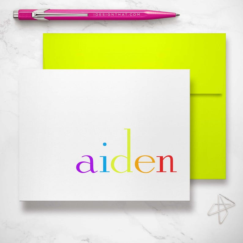 A lime envelope and rainbow stationery card create a fun baby stationery gift that inspires kids to write their own thank you notes.