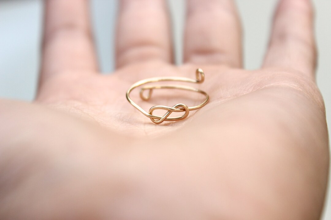 Infinity knot ring gold discount