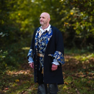 Entire Pirate costume including jacket, vest, sash, shirt, and pants