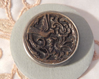 Bird with Fanciful Flower - Antique Brass Picture Button