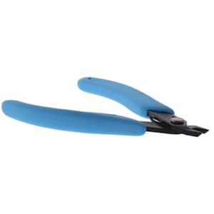 May include: Flush cutters with blue handles and black blades. The cutters are designed for precise cutting.