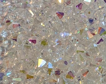 Beads - bicones 8mm - crystal AB glass - top drilled - 100pc