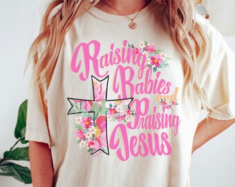 Christian Mama Tshirt Raising Babies Praising Jesus Floral Cross Comfort Colors, Praying Mama Faith Based Shirt Christian Streetwear Tee