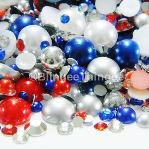 May include: A mix of red, white, and blue pearl and rhinestone embellishments. The embellishments are perfect for adding a touch of sparkle to crafts, clothing, and home decor.