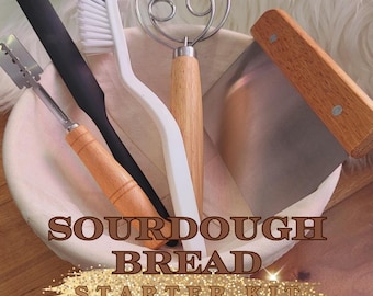 May include: A sourdough bread starter kit with a white ceramic bowl, a black silicone spatula, a white plastic dough scraper, a wooden handled dough scoring tool, a wooden handled dough whisk, and a wooden handled bread lame.