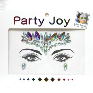 May include: A sheet of face jewels with iridescent and purple rhinestones in a crown design. The sheet also includes two teardrop-shaped jewels. The packaging says "Party Joy" and "Face Crystal".