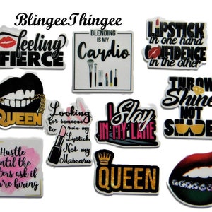 May include: A set of 10 colourful stickers with motivational quotes and images. The stickers feature phrases like "Feeling Fierce", "Queen", "Slay in My Lane", and "Throw Shine Not Shade".