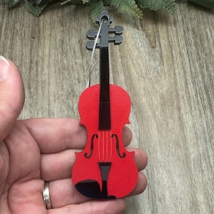 Adorno de violín en capas