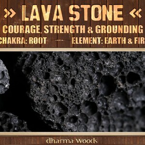 May include: A dark, porous lava stone with a rough, pitted texture. The image includes text that reads: LAVA STONE, COURAGE, STRENGTH & GROUNDING, CHAKRA: ROOT, ELEMENT: EARTH & FIRE, and dharma WOODS, set against a dark brown wooden background.
