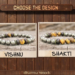 May include: Two beaded bracelets labeled Vishnu and Shakti. The Vishnu bracelet features metallic pyrite beads, dark wood, and tiger eye stones. The Shakti bracelet includes similar metallic pyrite, dark wood, and tiger eye beads. Text reads CHOOSE THE DESIGN.