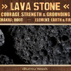 May include: A dark, porous lava stone with a rough, pitted texture. The image includes text that reads: LAVA STONE, COURAGE, STRENGTH & GROUNDING, CHAKRA: ROOT, ELEMENT: EARTH & FIRE, and dharma WOODS, set against a dark brown wooden background.