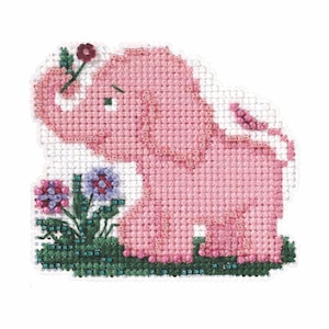 May include: A pink cross-stitch elephant with a flower in its trunk, standing in a patch of green grass with purple and pink flowers. The elephant is made of small, square stitches.