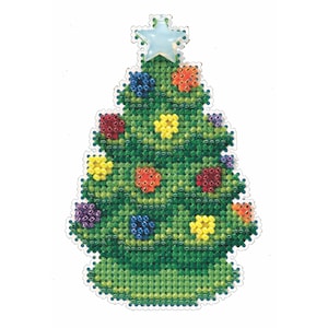 May include: A green cross-stitch Christmas tree ornament with colorful bead decorations. The tree is topped with a light blue star. The ornament has a scalloped edge and is set against a white background.