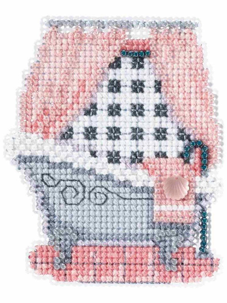 May include: A cross-stitch design featuring a bathtub scene. The artwork uses pink, gray, and white beads to depict a tub with a checkered window and a pink curtain. A pink seashell-shaped item is on the side.