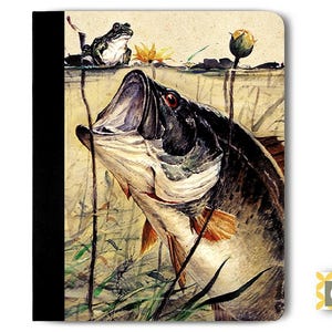 May include: A watercolor painting of a largemouth bass leaping out of the water with its mouth open. The bass is surrounded by green reeds and lily pads. A small frog is perched on a lily pad above the bass.