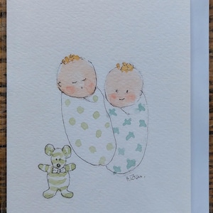 Une carte originale de bébé jumeau signée à l'aquarelle. Blanc à l'intérieur.  Carte OOAK.