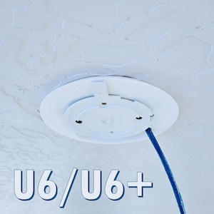 May include: A white ceiling mount for a U6/U6+ Wi-Fi router with a blue ethernet cable coming out of it.