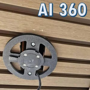 May include: A black round ceiling mount with a white logo and the text "AI 360" on a brown wooden surface.