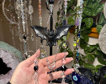 Atrapasol de cristal de murciélago de obsidiana negra