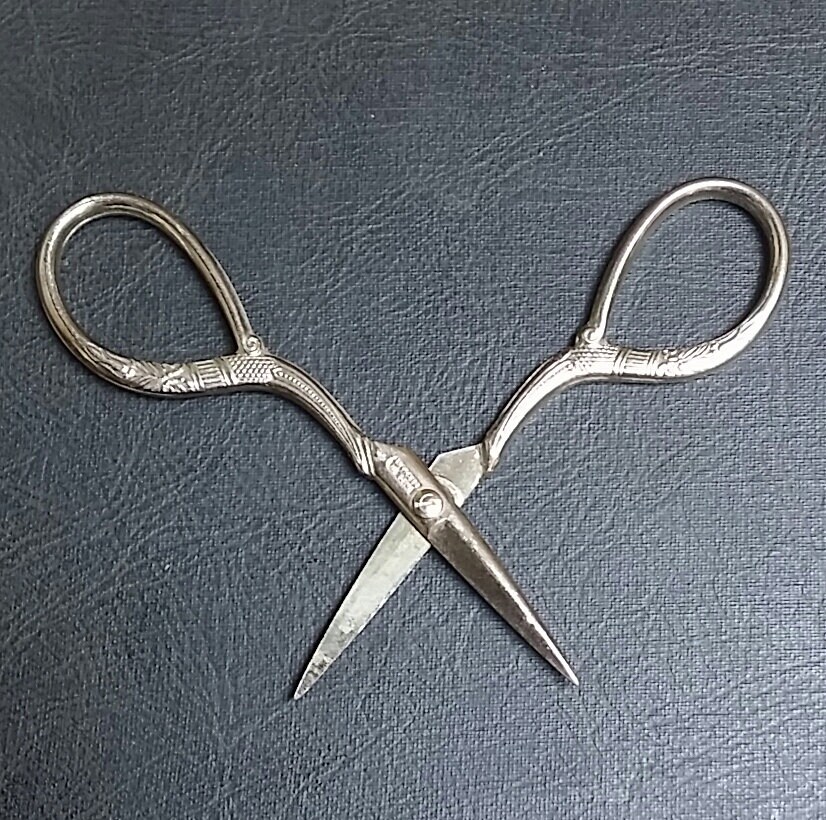 Vintage embroidery scissors with decorative design made in germany Vintage embroidery scissors with decorative design made in germany